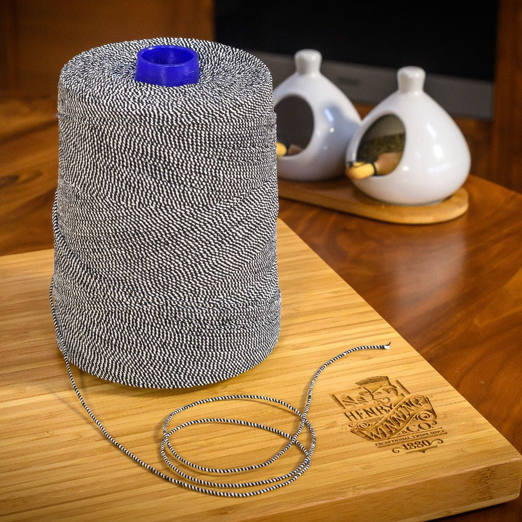 Black/White Elasticated Machine String / Twine Size in 1,904m/kg (800g). From £8.00 per spool