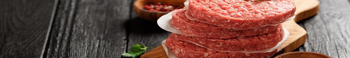Stacked burgers separated by burger discs.