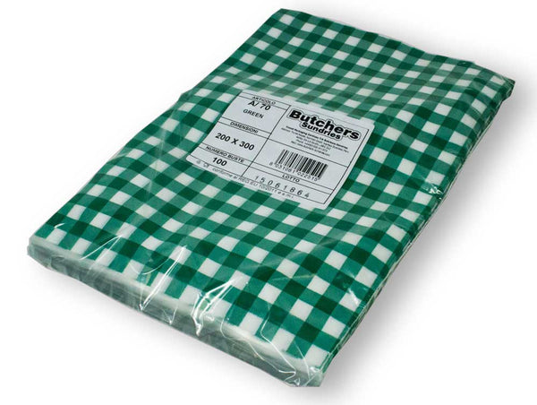 Wrapped green gingham vacuum pouches packed.