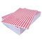Stack of red gingham sheets on top of one another.