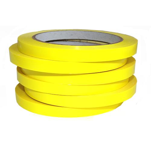 Stack of 6 yellow bag sealing tapes on rolls.